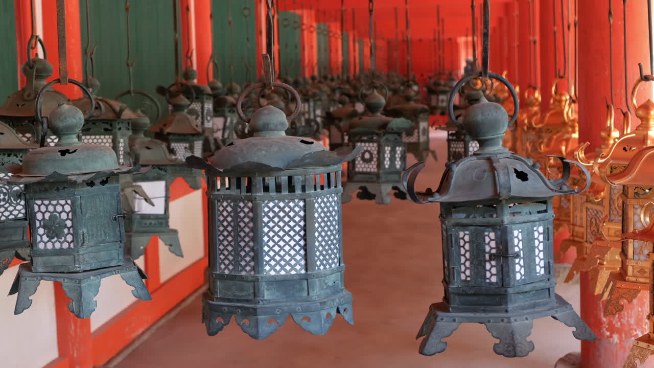 Architectural details of a sacred Japanese temple with decorative lanterns