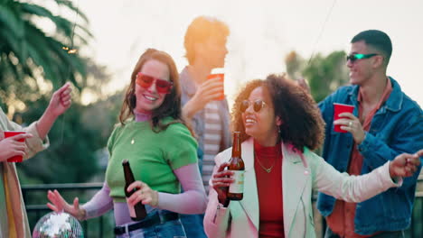 friends celebrating with sparklers and beer