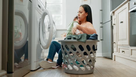 laundry, home and mother holding her baby