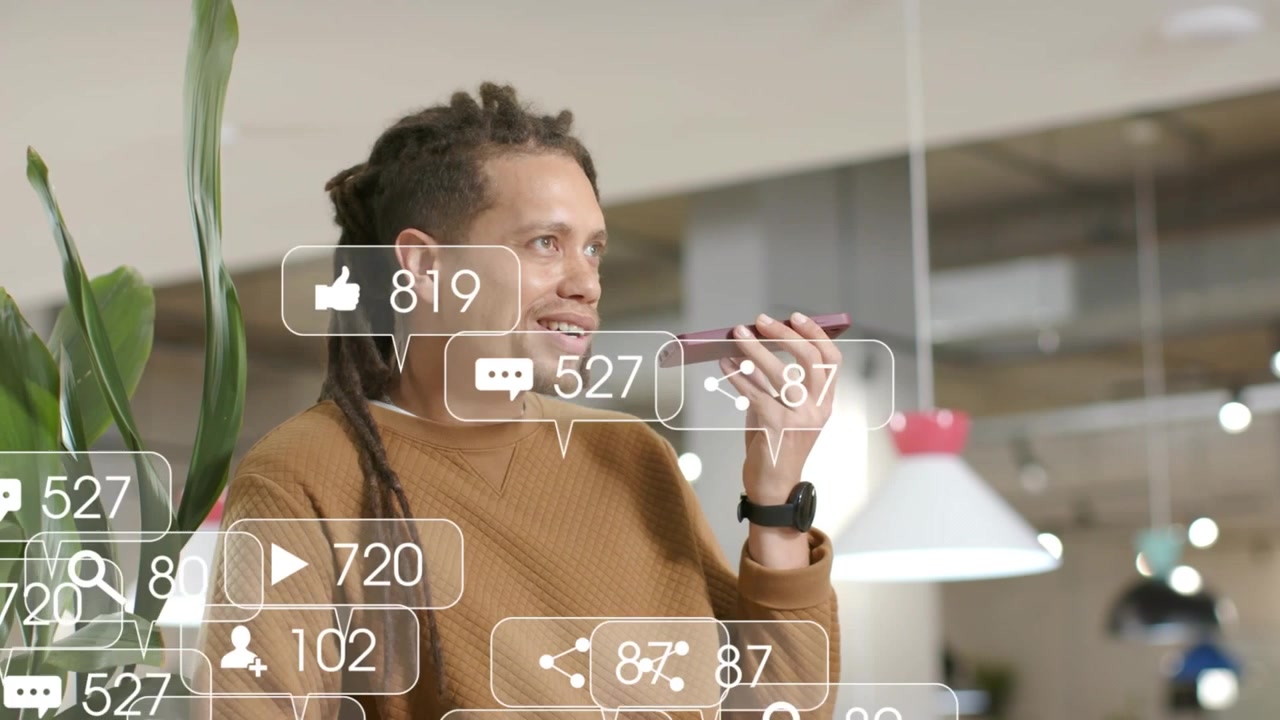 Man speaking into smartphone, causing social alerts to appear and grow around him in marketing