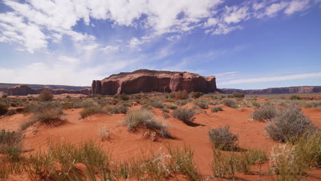 monument valley epic rock formation by itself in the middle of the vast desert