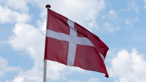 danish national flag fluttering in the wind slow motion