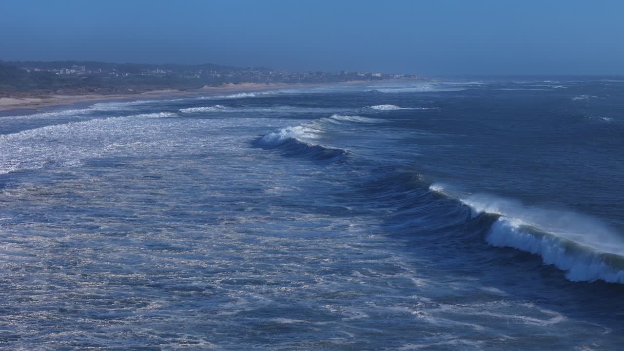 Waves breaking on Porto 70mm lens slow motion