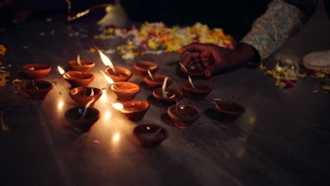 friends family decoarting for hindu festival of diwali