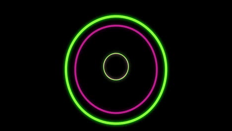 animación de círculos de neón verdes y rosados sobre un fondo negro.
