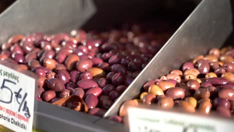 Different-types-of-olives-on-a-Greek-market-stall