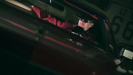 happy casino gambler in the classic car listening his favorite country music songs.