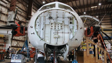 Construction-of-an-airplane-in-a-hangar