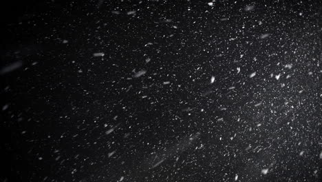 una densa tormenta de nieve vfx insertada en cámara lenta en una pantalla negra