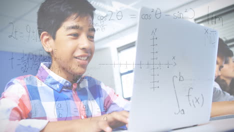 animation of mathematical equations over schoolboy using laptop in classroom