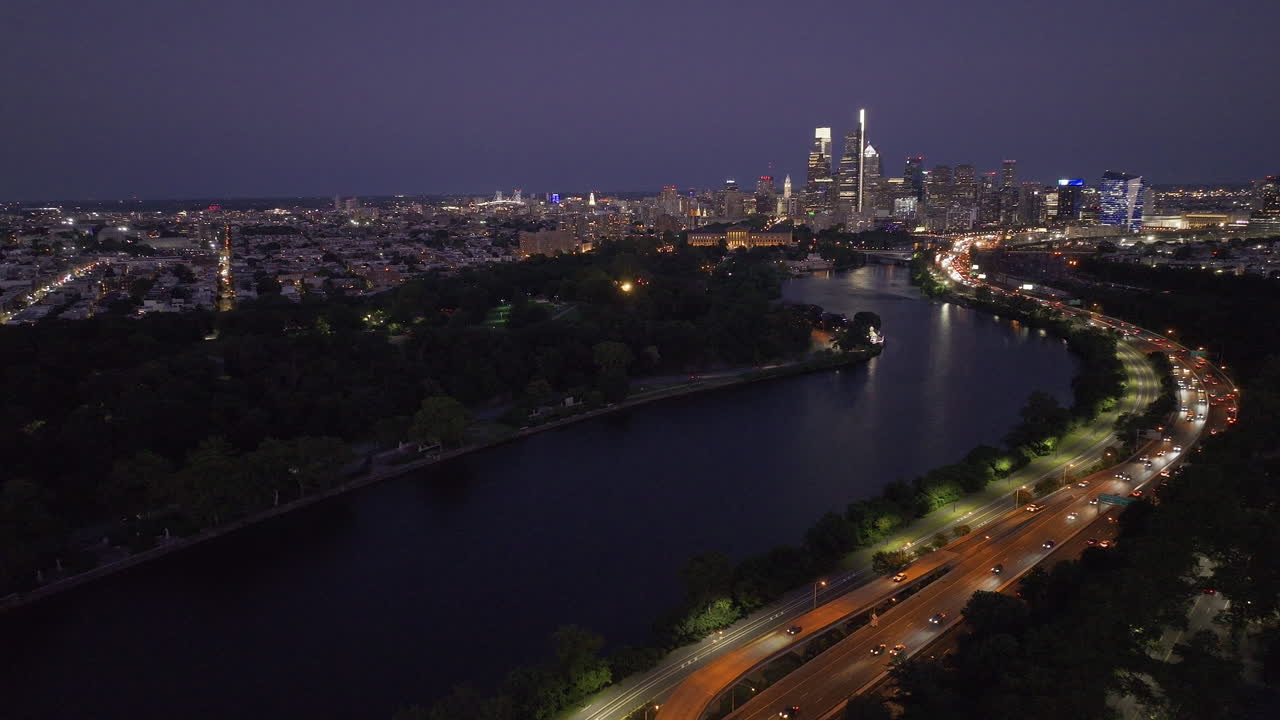Aerial view of the Philadelphia skyline at night. Shot along the Schuylkill River