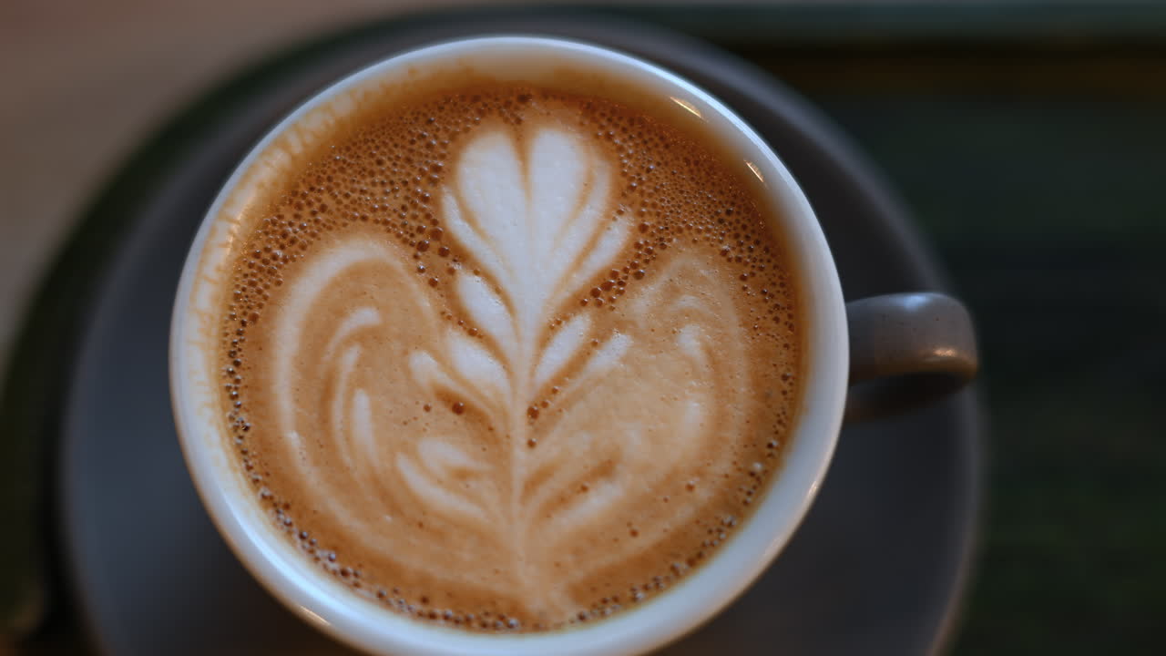 Top down shot of foam latte art on coffee