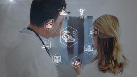 processing medical data animation over doctors examining x-ray in hospital