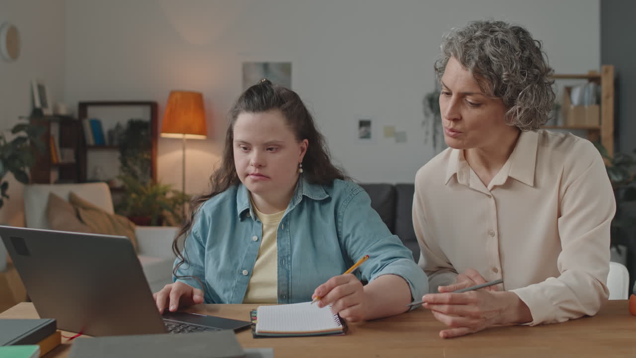 Tutoring session for a girl with Down syndrome