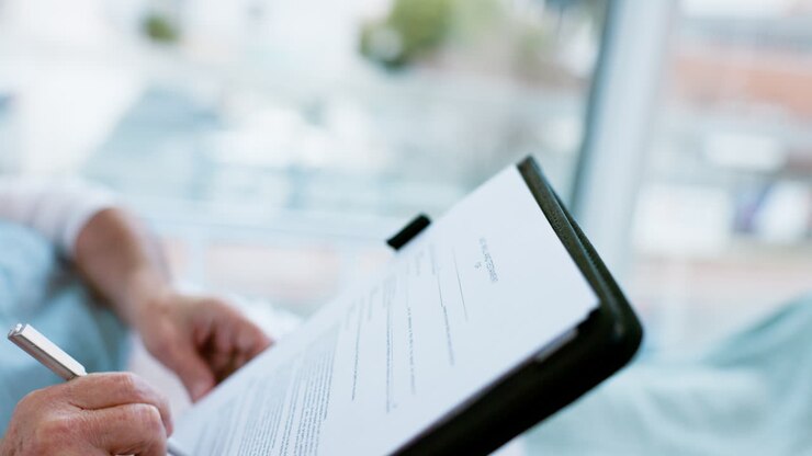 Hands, contract and patient signature in hospital