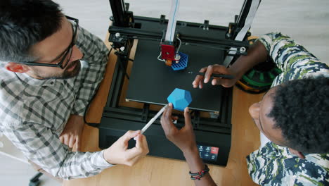 two men collaborate on 3d printing project