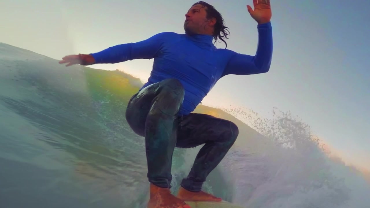 Dynamic Motion Graphics Featuring Surfing Footage and Text Overlays