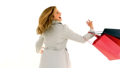 Woman-spinning-with-shopping-bags