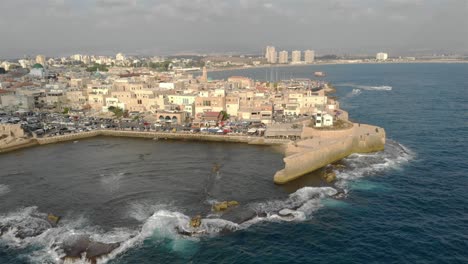 aerial footage over the old city of acre and the mediterranean sea