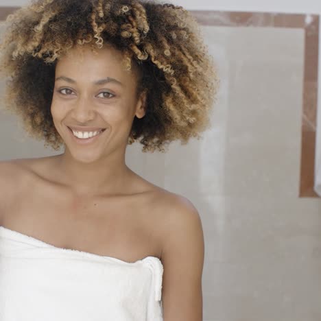 smiling young woman in towel