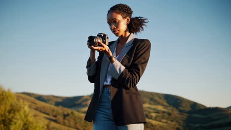 a woman holding a camera