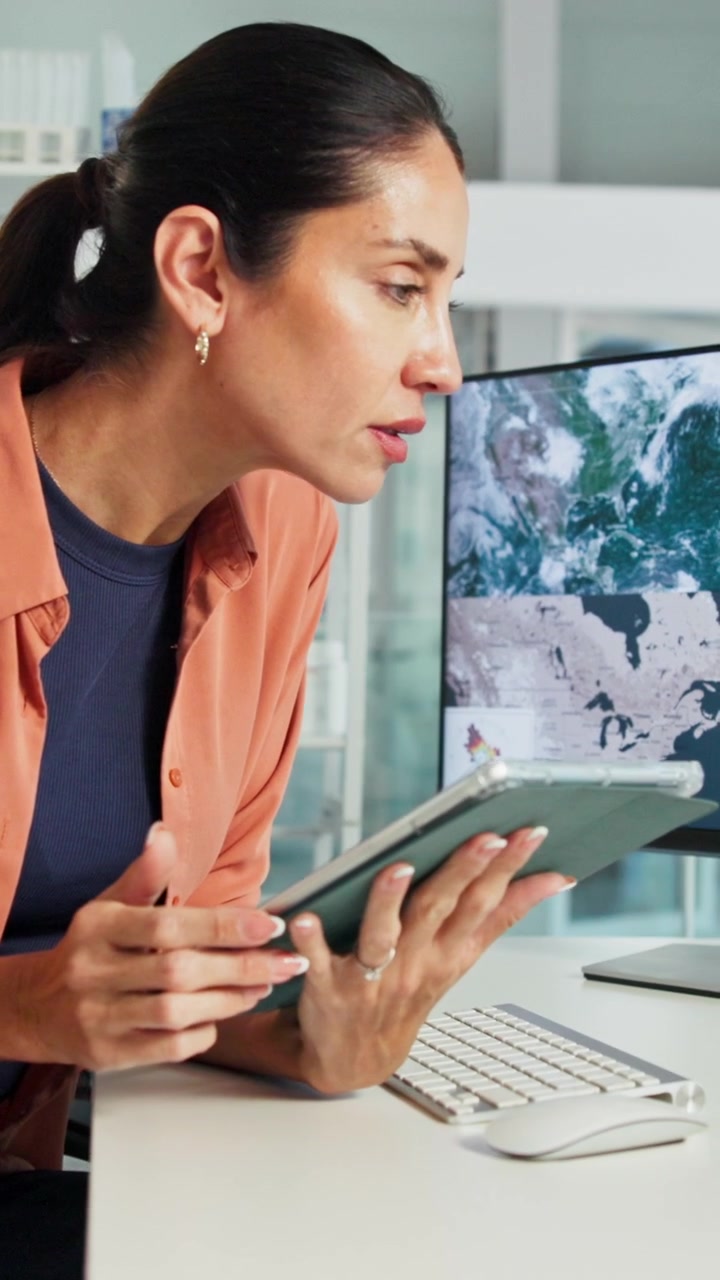 Female Scientist Analyzing Data on Tablet in Laboratory
