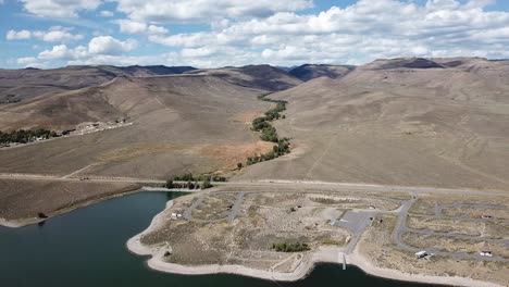 beautiful aerial 4k drone shot blue sky lake in nevada dolly in
