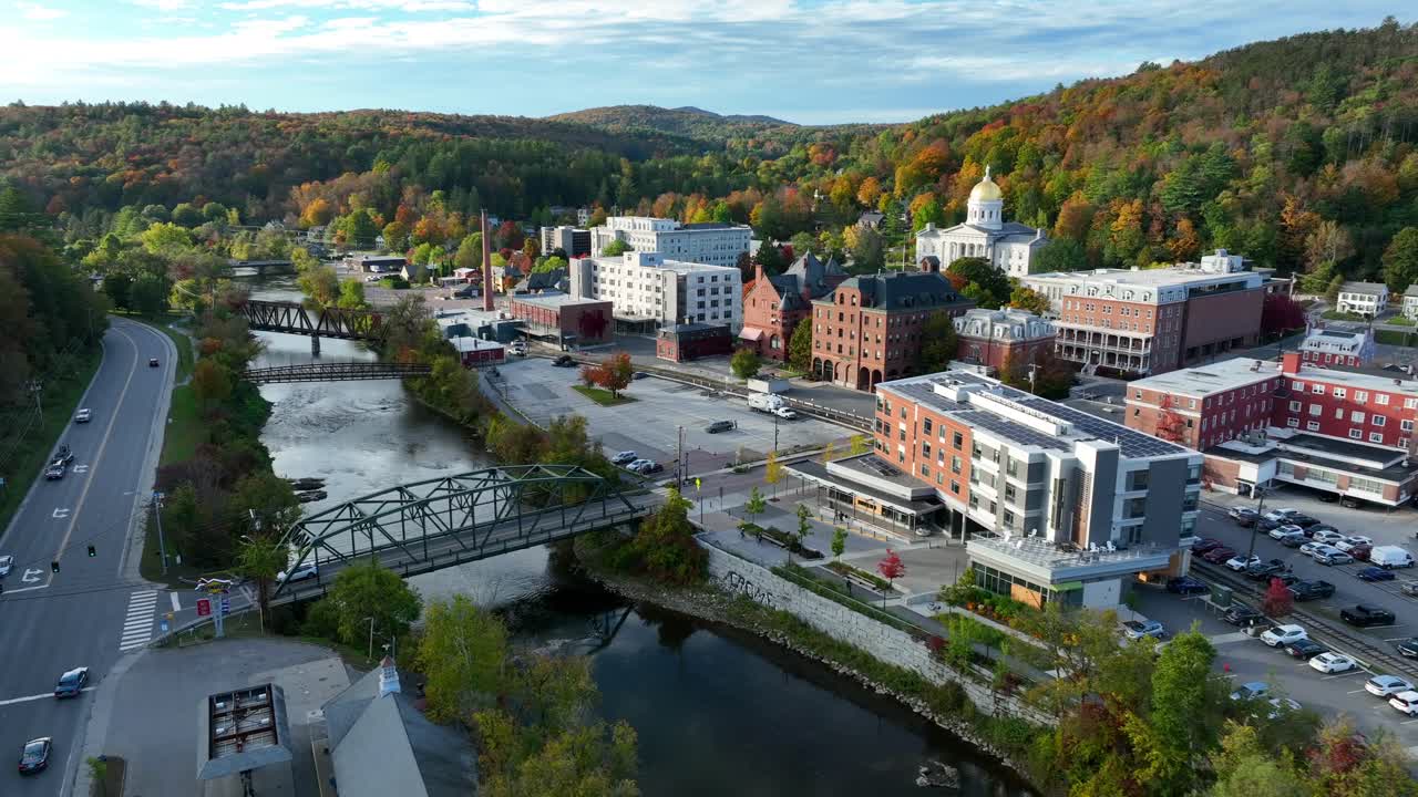 Montpelier Vermont aerial establishing shot of Winooski River and state capitol dome