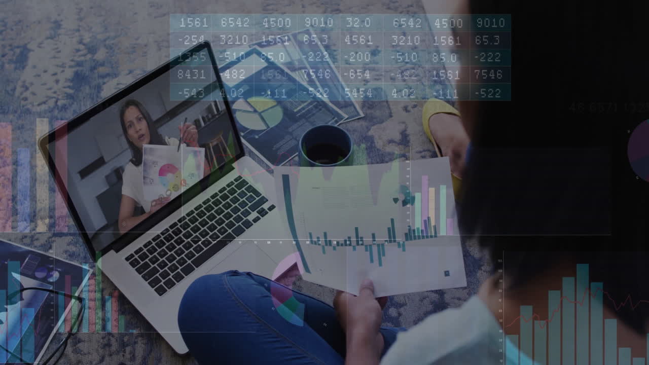 Person analyzing financial charts on laptop with data processing animation overlay