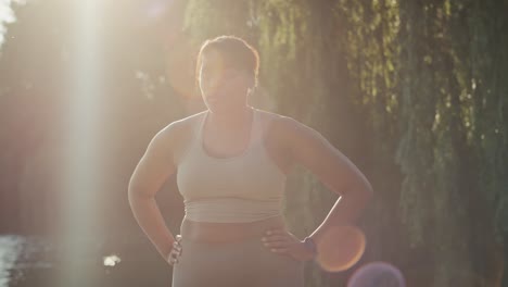 African-American-woman-breathing-after-the-running-at-the-park.