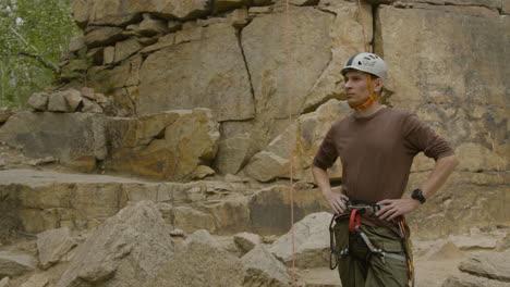 climber at the bottom of the cliff