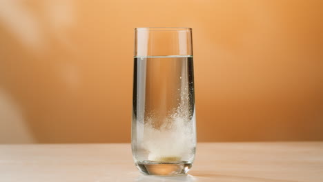 dissolving a tablet in water