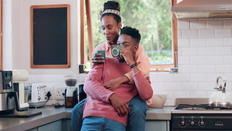 Coffee,-relax-and-black-couple-in-home-with-love