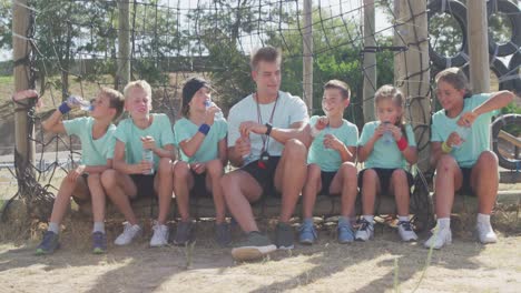 group of caucasian boys and girls at boot camp together