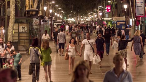 nighttime scene of la rambla in barcelona