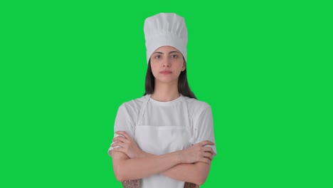 Portrait-of-Indian-female-professional-chef-Green-screen