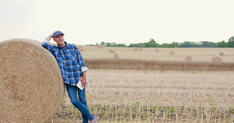agriculture farmer examining field modern farming 14