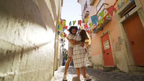 happy couple running on city street