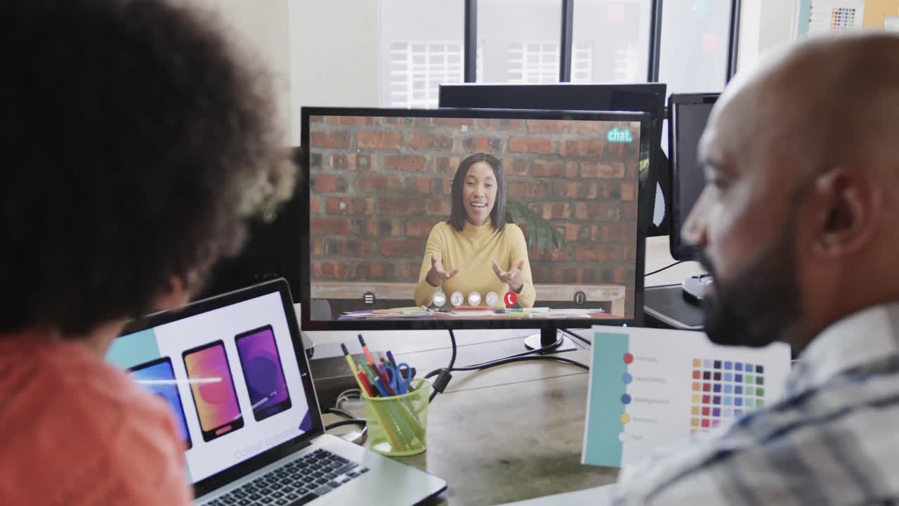 African american business people on video call with caucasian female colleague on screen