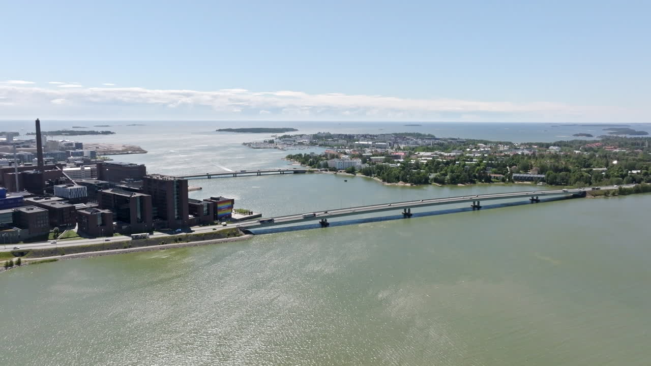Panoramic drone shot of traffic on Finnish national road 51, summer in Helsinki