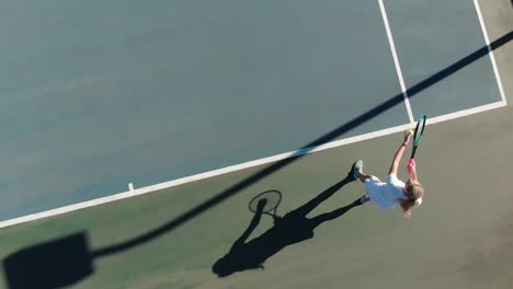 video of top view of caucasian female tennis player on court