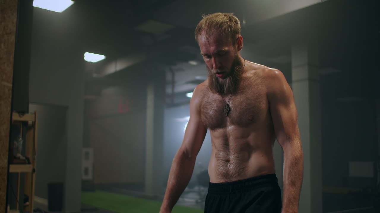 Premium stock video - Sweaty tired athlete with vapor in slow motion in ...