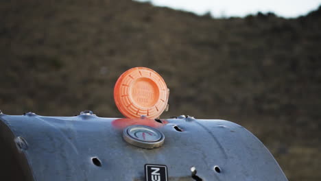 plastic frisbee shot with bullets down closeup
