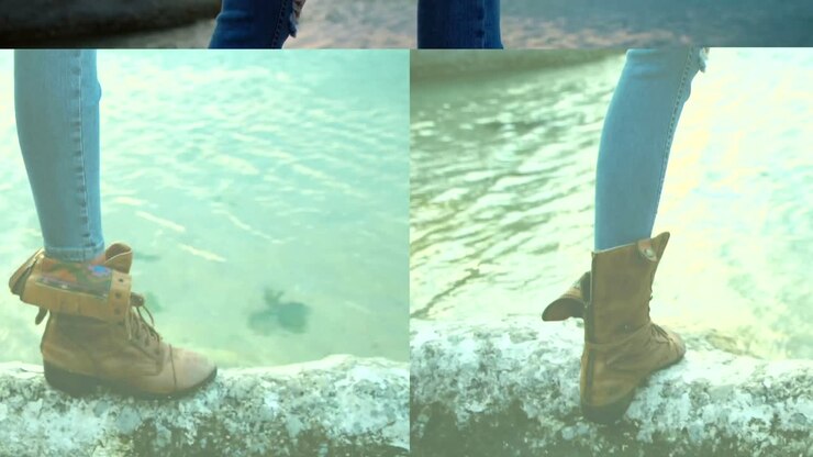 Woman standing on rock at beach 4k