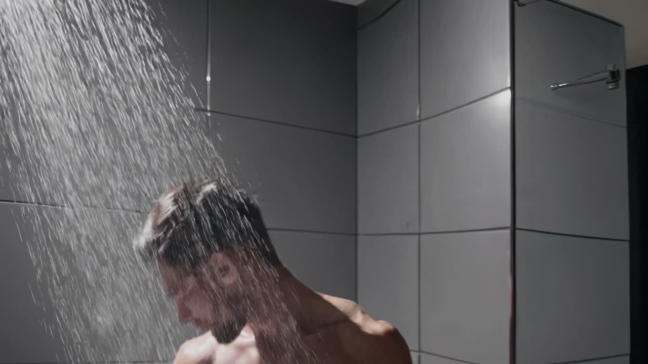 Man showering in a bathroom