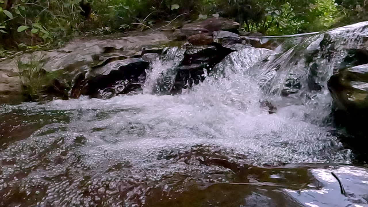 Slow motion, pure cleansing water, rushing torrents, wilderness sounds