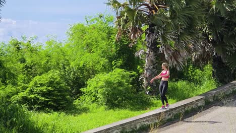 woman walking outdoors in a park