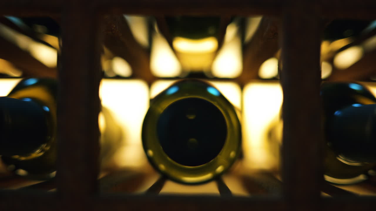Wine bottles on a shelf in rich restaurant