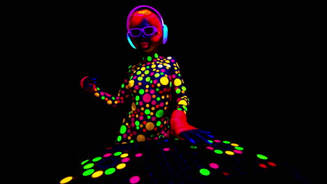 disco female glow dj covered in flurorescent spots