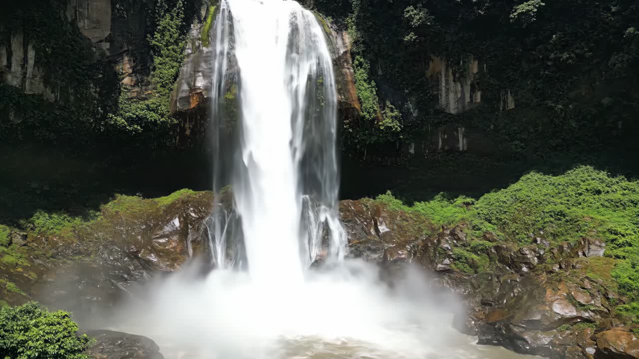 A Beautiful Waterfall in a Lush Landscape